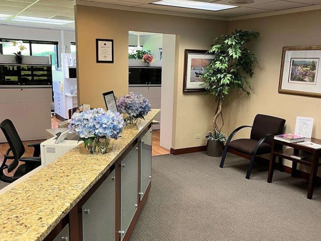 A warm front desk and comfortable waiting area.